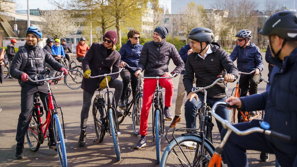 Coalition members riding through Amsterdam during a partner meeting